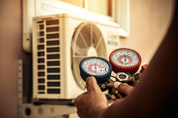 Professional Heat Pump Repair technician working in Red Hill, PA